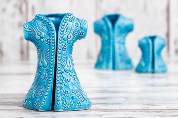 Turkish Handmade  Symbolic Ceramic Figurines on White Wooden Background