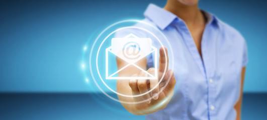 Businesswoman touching 3D rendering flying email icon with her finger