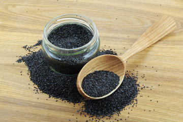 Poppy in glass and spoon