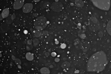 snow on a black background texture overlay bokeh highlights