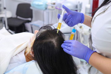 Naklejka premium Researcher performs blood centrifuging