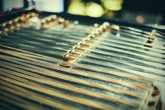 Wooden dulcimer traditional musical instrument.