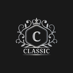 Vector monogram logo template. Luxury letter design. Graceful vintage character with crown illustration for hote etc.