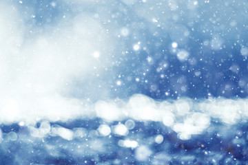 silvery blue highlights snow rain water blurred background