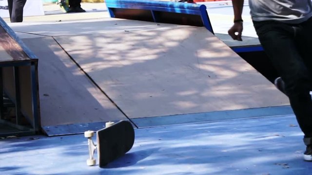 Skateboard and man fell down and drop from ramp in slow motion