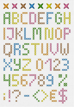 Colorful cross stitch uppercase english alphabet with numbers and symbols. Isolated on white cloth texture