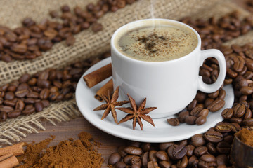 Cup of coffee and coffee beans