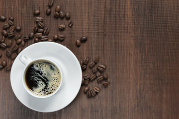 Cup of coffee and coffee beans