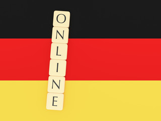 Business Concept: Letter Tiles Online On Germany Flag, 3d illustration