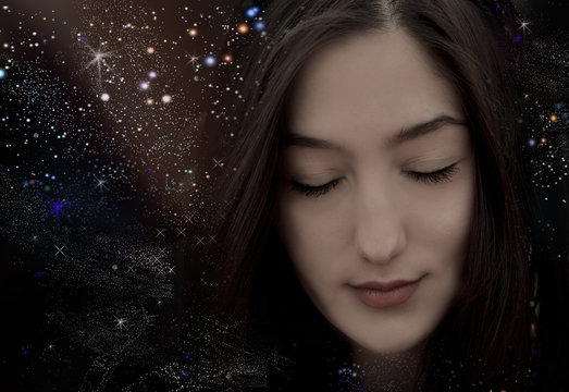 Meditation in space, the woman dreams having closed eyes
