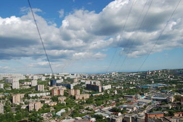 Vladivostok hills and buildings, clear sky, beautiful clouds