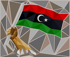 Man's Arm Raising The National Flag Of Libya