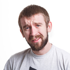 Fototapeta premium Unpleasant emotions, man feeling confused