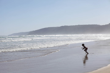 playing on the beach