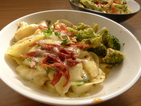 two plates with dumplings