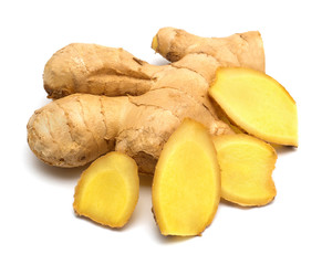 Fresh ginger root cut into cubes isolated on a white background