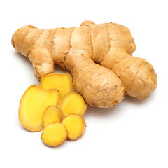 Fresh ginger root cut into cubes isolated on a white background
