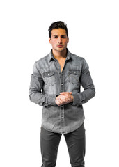 Confident, attractive young man with denim shirt