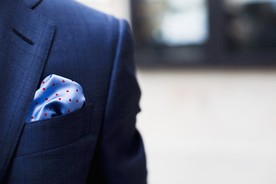 Close up of elegant man wearing full suit