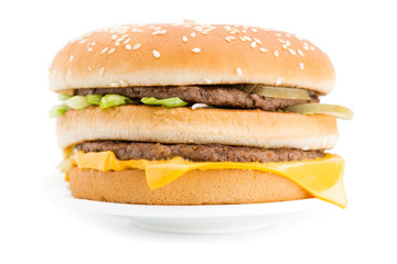 Fast food hamburger close-up isolated on white