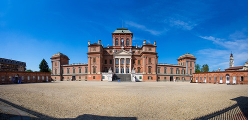 RACCONIGI, ITALY, APRIL 11, 2017 - Facade of Racconigi Royal Palace - former royal residence of Savoy house in Piedmont, Cuneo province, Italy