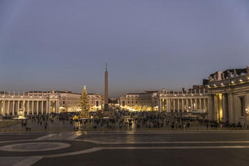 Tourists at Saint Peter's Square at night in Vatican City, Vatican