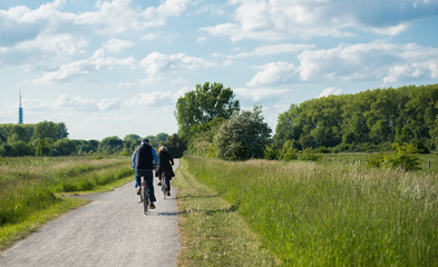 Obraz premium Mature couple riding on the bike