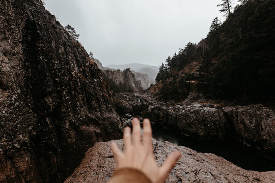 Male hand reaching out forward
