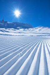 Fototapeta na wymiar Snow path ski track surface