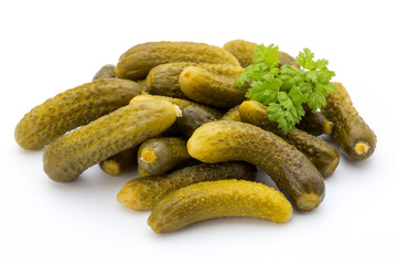 Marinated pickled cucumbers isolated on the white.