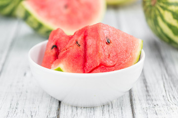 Portion of Fresh Watermelon on wooden background (selective focus).