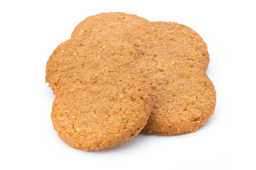 Stacked short pastry cookies isolated on white background.