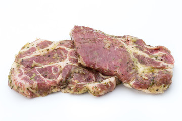 Pork chop, marinated. Isolated on the white background.