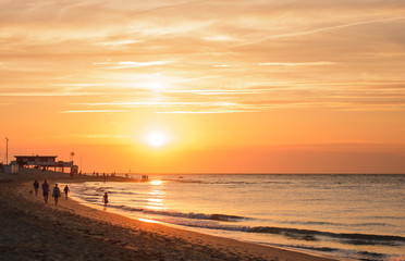 Beautiful warm summer sunset at the beach