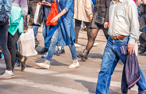 people crossing the pedestrian crossing