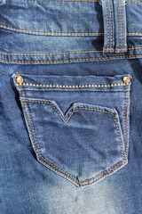 Fototapeta premium Pocket on blue jeans