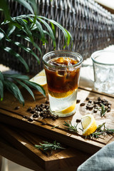 Coffee cocktail with lemon and tonic - vertical