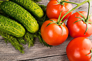 Tomatoes and cucumber on the table