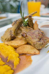Lamb steak with rosemary and pumpkin potato.