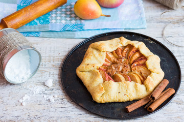 Galette with apples on a metal tray
