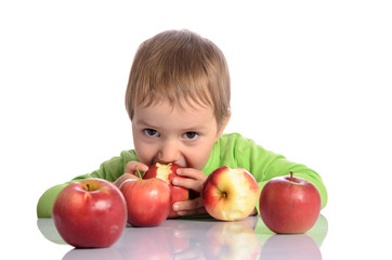 Fototapeta na wymiar cute child with red apples isolated on white background