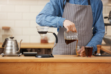  Barista pouring coffee