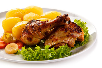 Roast chicken leg with potatoes