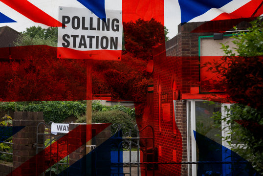polling station sign and Union Jack flag - UK prepares for elections