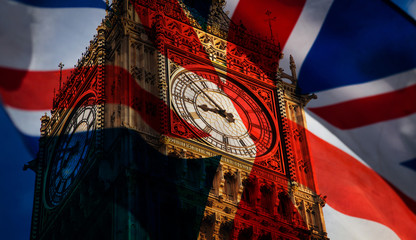 union jack flag and iconic Big Ben at the palace of Westminster, London - the UK prepares for new elections