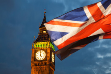 Obraz na płótnie Canvas union jack flag and iconic Big Ben at the palace of Westminster, London - the UK prepares for new elections