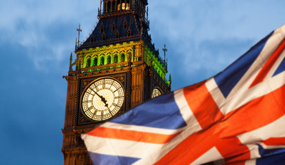 Fototapeta na wymiar union jack flag and iconic Big Ben at the palace of Westminster, London - the UK prepares for new elections