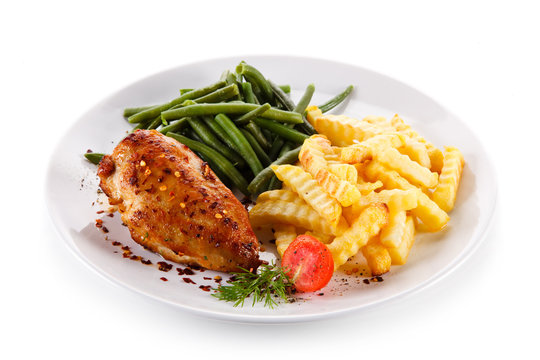 Roast chicken fillet with french fries