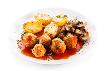 Roast meatballs with potatoes