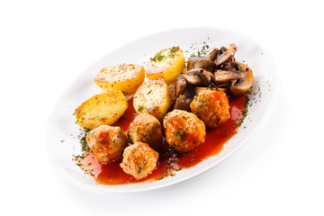 Roast meatballs with potatoes
